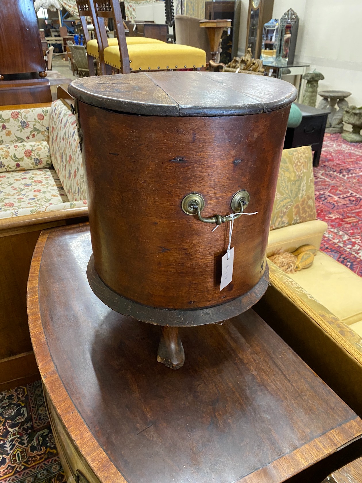 A George III style circular mahogany work box, diameter 38cm, height 47cm